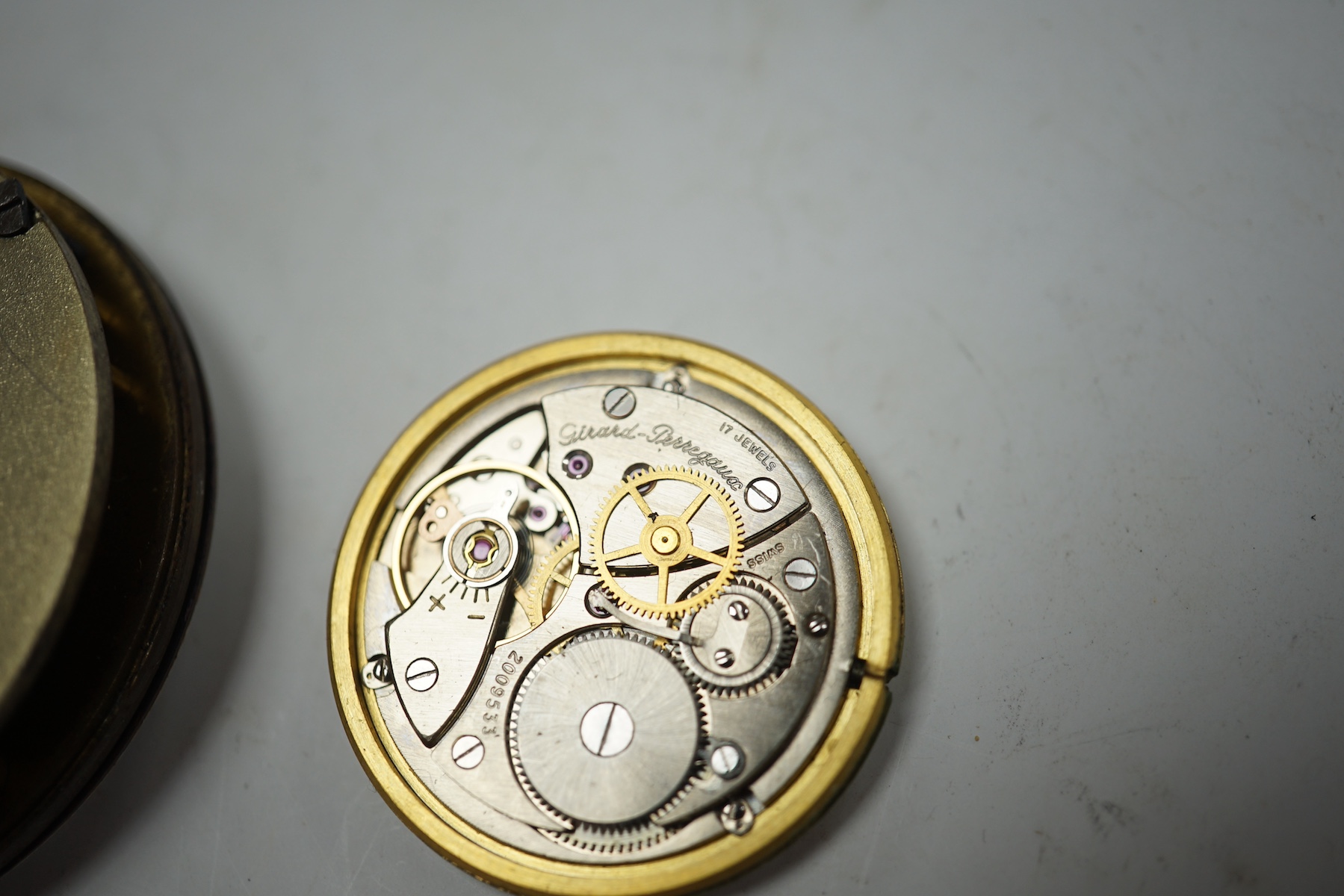 A gentleman's stainless steel Omega Seamaster manual with wrist watch, case diameter 35mm, on associated bracelet, together with three assorted pocket watches, a Girard Perregaux wrist watch movement and assorted silver